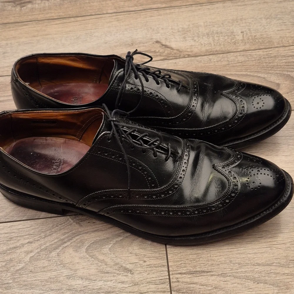 Allen Edmonds black wear signs